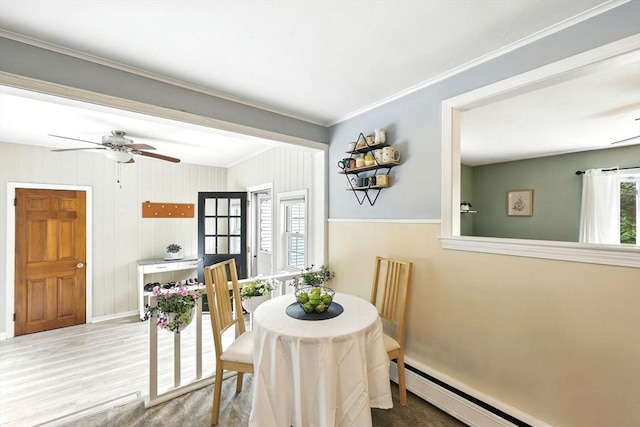 59 Searle Rd, South Hadley, MA 01075 - dining room with ornamental molding, wood finished floors, a baseboard radiator, and ceiling fan