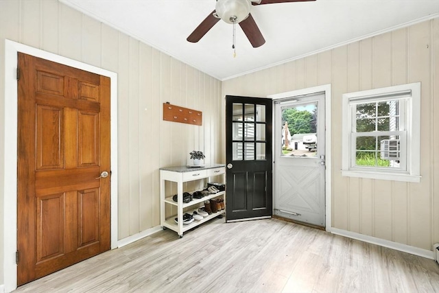 59 Searle Rd, South Hadley, MA 01075 - entryway with ornamental molding, light wood-type flooring, a ceiling fan, and baseboard heating