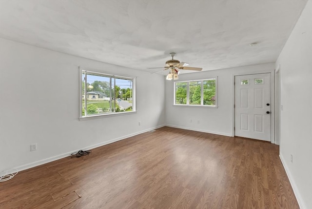 76 Choctaw Dr, Wareham, MA 02532 - spare room featuring a ceiling fan, wood finished floors, and baseboards