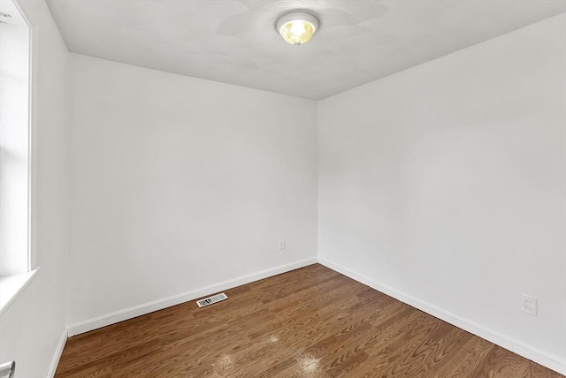 76 Choctaw Dr, Wareham, MA 02532 - unfurnished room with wood finished floors, baseboards, and a ceiling fan