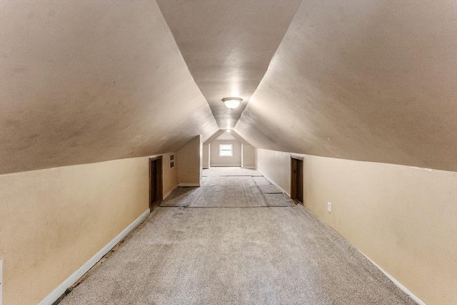 76 Choctaw Dr, Wareham, MA 02532 - additional living space with carpet, lofted ceiling, and baseboards