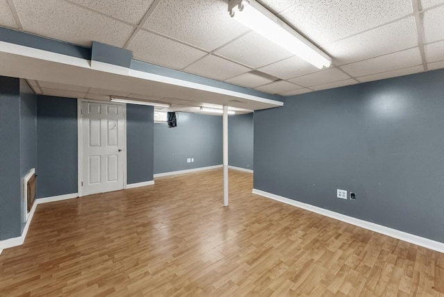 76 Choctaw Dr, Wareham, MA 02532 - finished basement featuring baseboards, a drop ceiling, and light wood finished floors