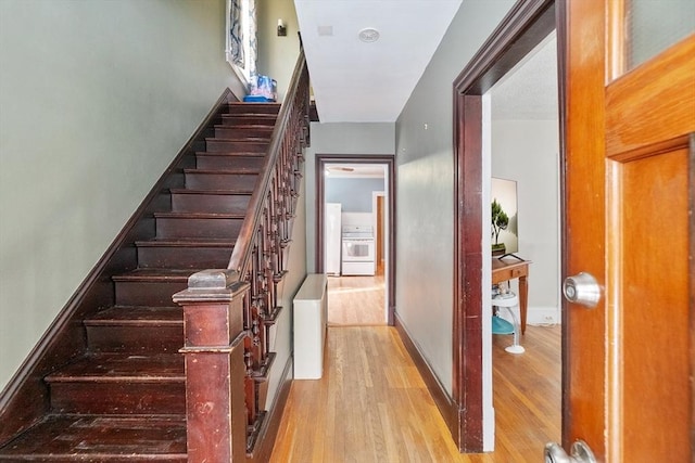 staircase with wood-type flooring