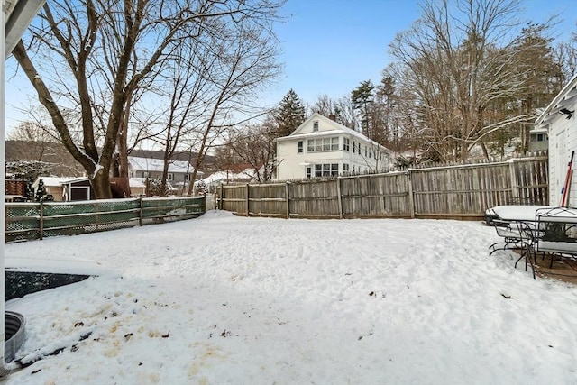 view of snowy yard