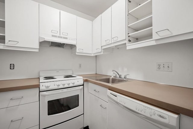 kitchen featuring a sink, white cabinetry, white appliances, and under cabinet range hood