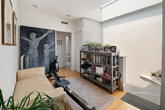 office area with light hardwood / wood-style floors