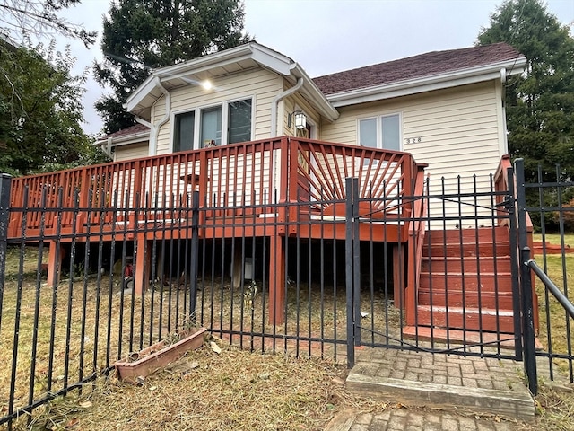 exterior space with a yard and a deck