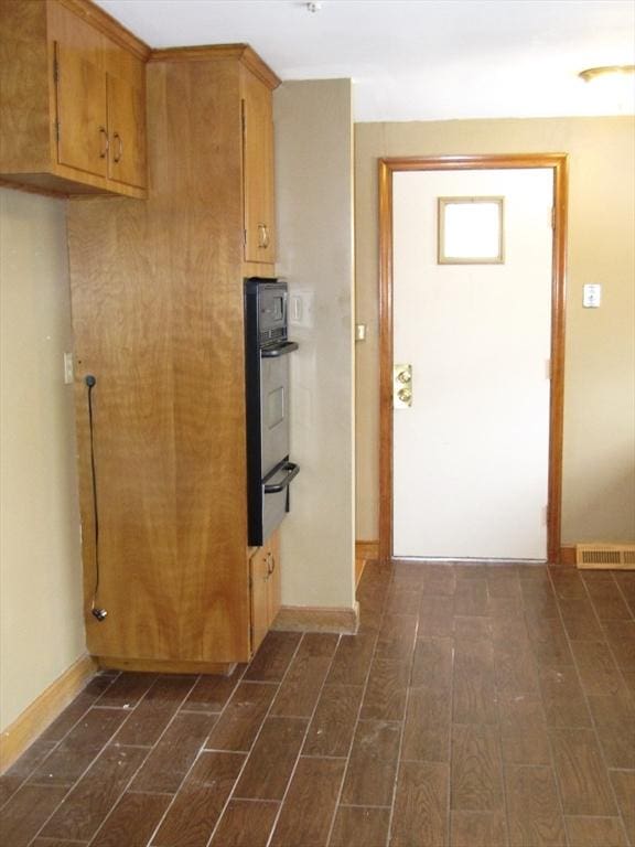 kitchen with stainless steel oven