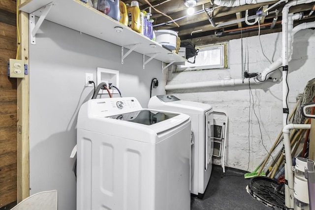 laundry area featuring washer and clothes dryer