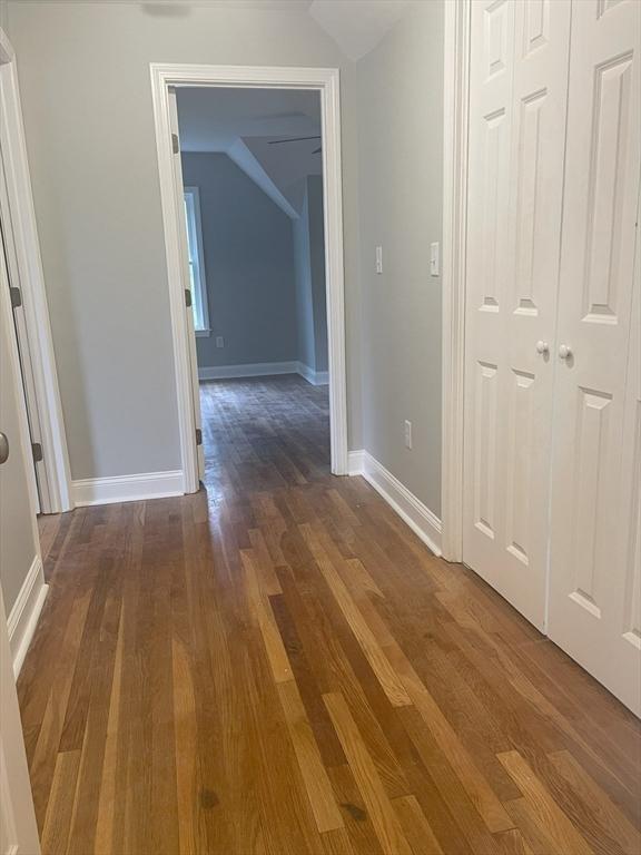 15 Forest St, Whitman, MA 02382 - hall featuring wood finished floors, lofted ceiling, and baseboards