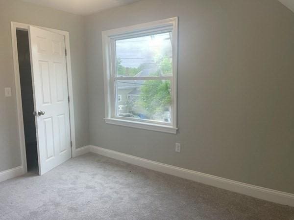 15 Forest St, Whitman, MA 02382 - unfurnished room featuring light colored carpet and baseboards