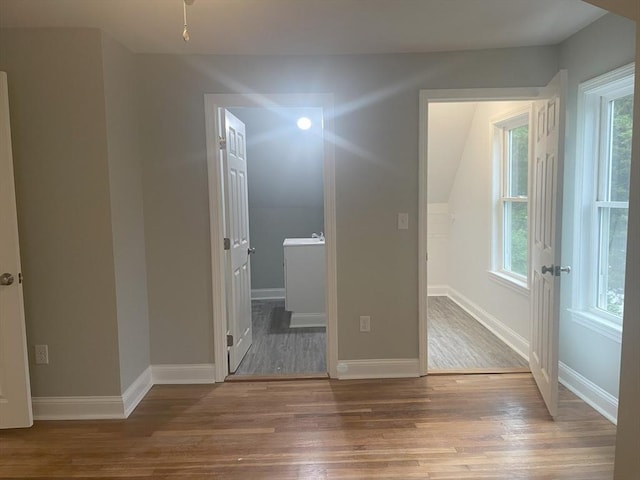 15 Forest St, Whitman, MA 02382 - empty room with wood finished floors and baseboards