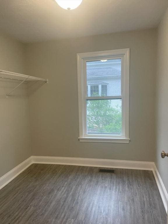 15 Forest St, Whitman, MA 02382 - unfurnished room featuring dark wood finished floors and baseboards