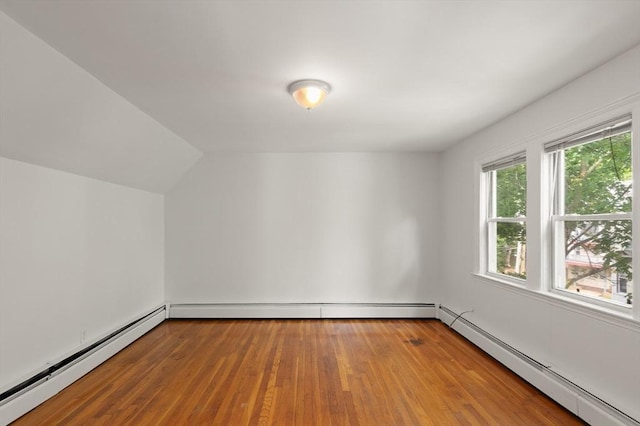 36 Kings Bch, Swampscott, MA 01907 - bonus room featuring a baseboard radiator, a baseboard heating unit, lofted ceiling, and wood finished floors