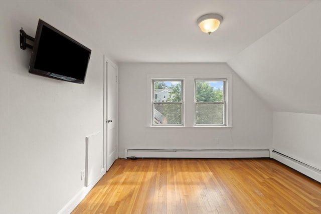 36 Kings Bch, Swampscott, MA 01907 - bonus room with light wood-style floors, a baseboard heating unit, and vaulted ceiling