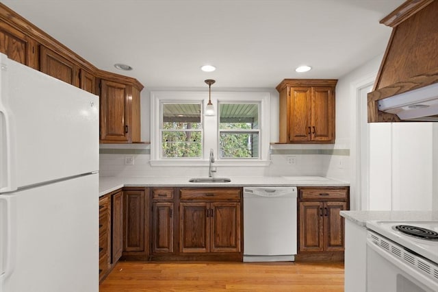 36 Kings Bch, Swampscott, MA 01907 - kitchen with white appliances, a sink, light countertops, decorative backsplash, and recessed lighting