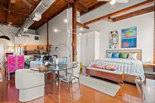 49 Munroe St Unit 405, Lynn, MA 01901 - dining area with high vaulted ceiling, a wood ceiling with exposed beams, wood finished floors, and a ceiling fan