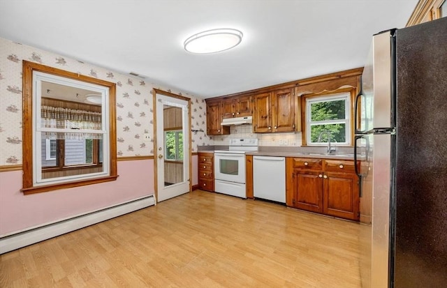 49 Whitman St, Weymouth, MA 02189 - kitchen featuring white appliances, baseboard heating, wallpapered walls, a sink, and under cabinet range hood