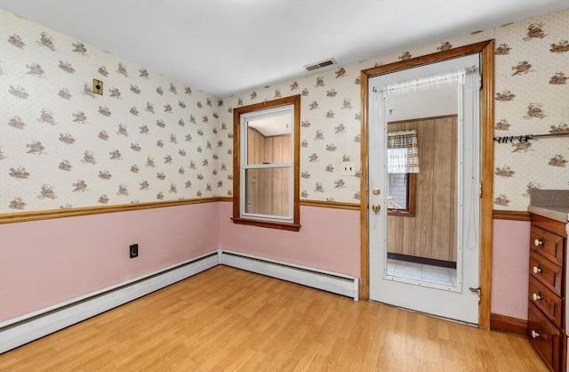 49 Whitman St, Weymouth, MA 02189 - unfurnished bedroom featuring light wood-type flooring and wallpapered walls