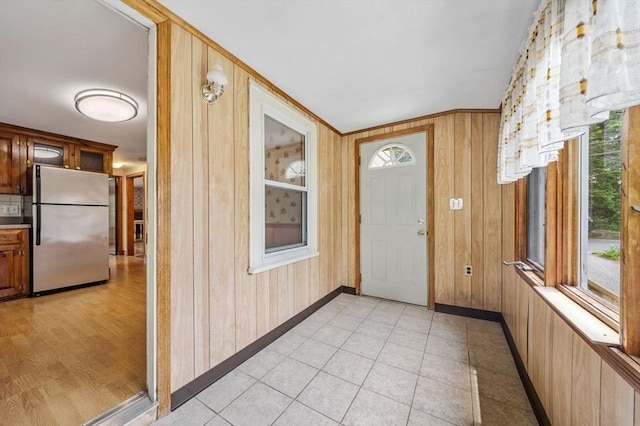 49 Whitman St, Weymouth, MA 02189 - foyer entrance with wooden walls and baseboards