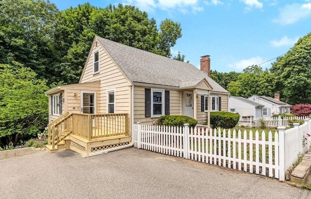 49 Whitman St, Weymouth, MA 02189 - view of front of house with a chimney and a shingled roof