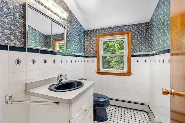 49 Whitman St, Weymouth, MA 02189 - bathroom featuring tile walls, plenty of natural light, wallpapered walls, toilet, and vanity