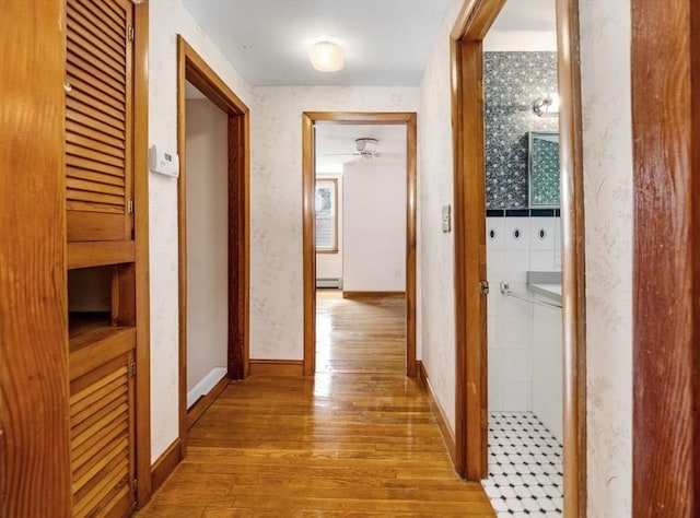 49 Whitman St, Weymouth, MA 02189 - hall with hardwood / wood-style floors, a baseboard heating unit, and wallpapered walls
