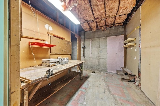 49 Whitman St, Weymouth, MA 02189 - below grade area with a workshop area