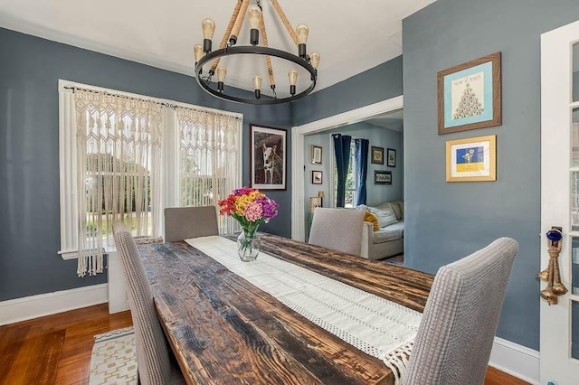 76 Colburn St Unit 76, Dedham, MA 02026 - dining space featuring a chandelier and wood finished floors
