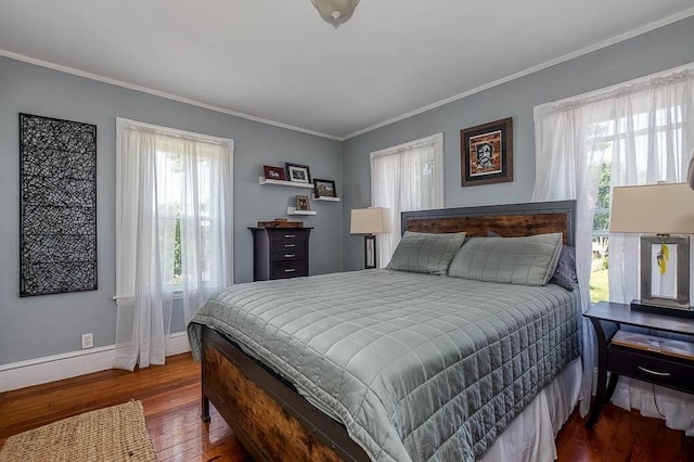 76 Colburn St Unit 76, Dedham, MA 02026 - bedroom with dark wood-style flooring and crown molding
