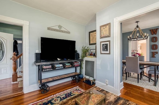 76 Colburn St Unit 76, Dedham, MA 02026 - living area with wood finished floors, a chandelier, and stairway