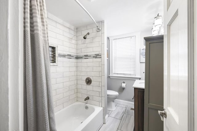 72 Edgecliff Rd Unit 72, Watertown, MA 02472 - full bath featuring shower / tub combo with curtain, toilet, vanity, baseboards, and tile patterned flooring