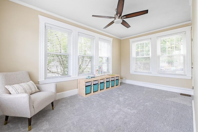 72 Edgecliff Rd Unit 72, Watertown, MA 02472 - sitting room featuring baseboards, ceiling fan, carpet floors, and crown molding