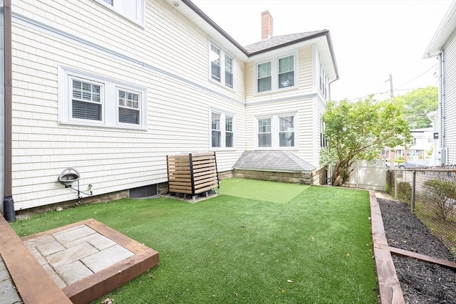 72 Edgecliff Rd Unit 72, Watertown, MA 02472 - rear view of property with a chimney