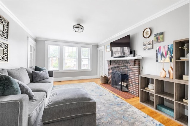 72 Edgecliff Rd Unit 72, Watertown, MA 02472 - living room featuring ornamental molding, a brick fireplace, wood finished floors, and baseboards