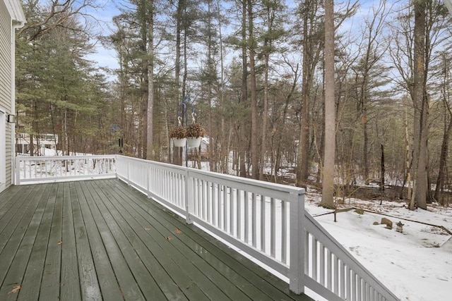 view of snow covered deck