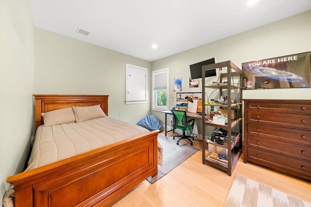 bedroom featuring visible vents, recessed lighting, and light wood-type flooring