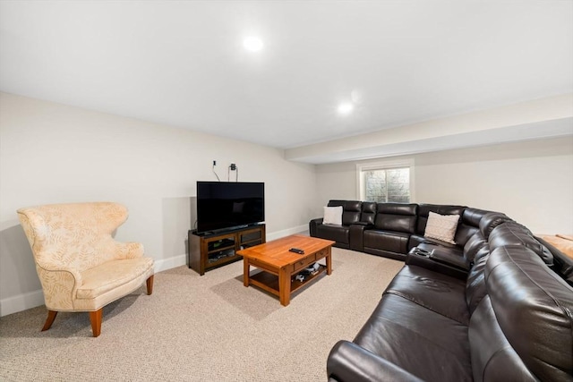 living area featuring recessed lighting, light colored carpet, and baseboards