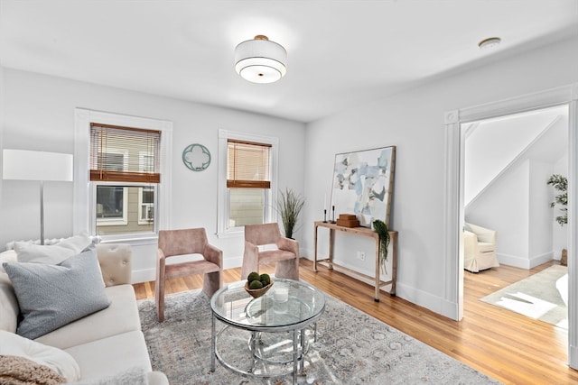 living room with light hardwood / wood-style floors