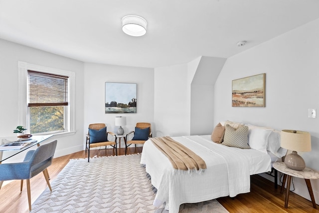 bedroom with light wood-type flooring