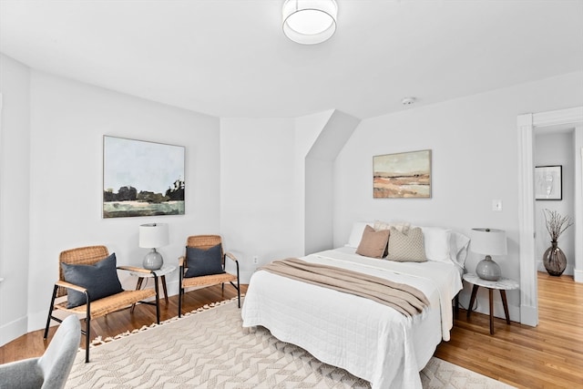 bedroom with light hardwood / wood-style flooring