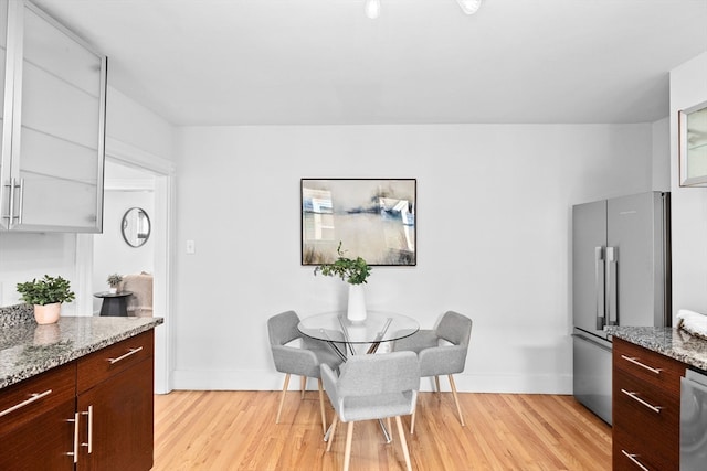 dining room featuring light wood-type flooring