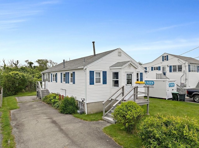 14 Mcarthur Ln, Marshfield, MA 02050 - manufactured / mobile home featuring roof with shingles and a front yard