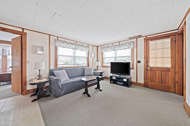 14 Mcarthur Ln, Marshfield, MA 02050 - living area featuring light carpet, baseboards, and light tile patterned flooring