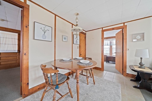14 Mcarthur Ln, Marshfield, MA 02050 - dining room featuring ornamental molding, baseboards, and light tile patterned floors
