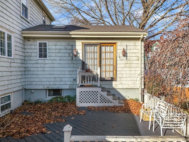 doorway to property featuring a deck