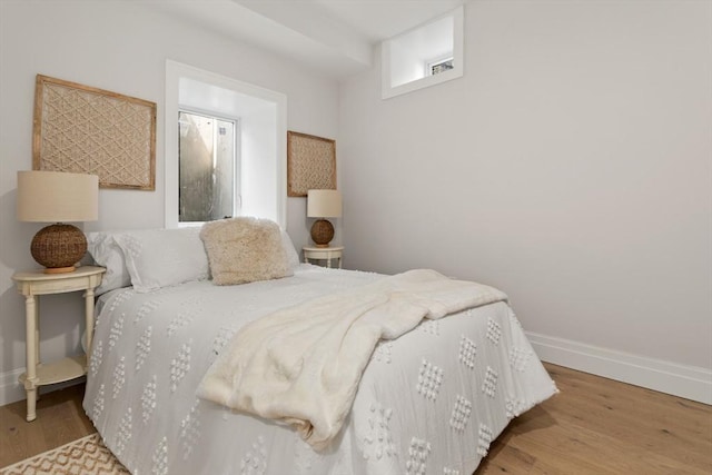 bedroom featuring light hardwood / wood-style flooring