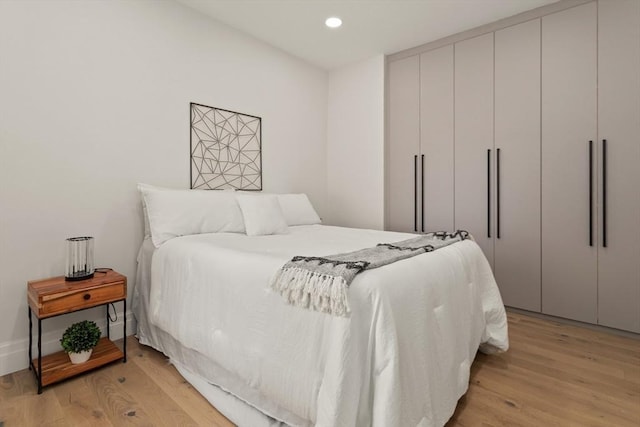 bedroom featuring light hardwood / wood-style flooring