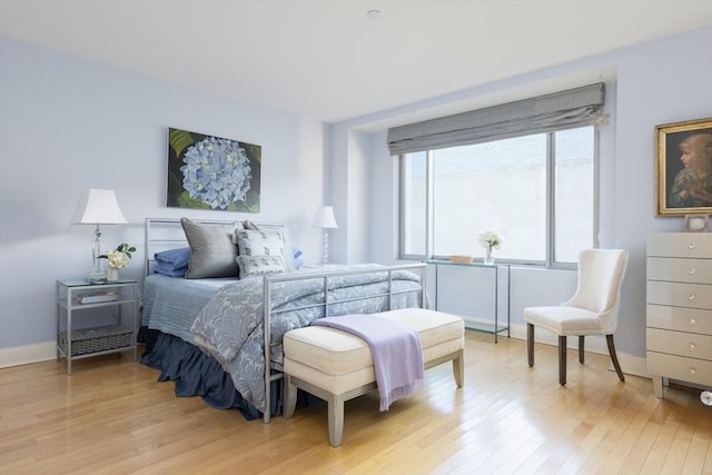 bedroom featuring light hardwood / wood-style floors