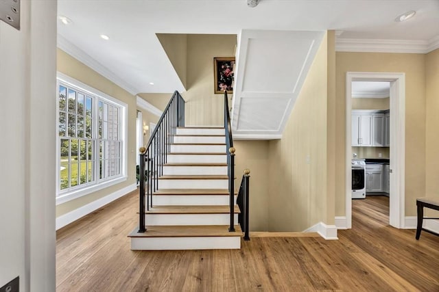 10 Herring Gull Rd, Mashpee, MA 02649 - stairway with wood finished floors, crown molding, and recessed lighting